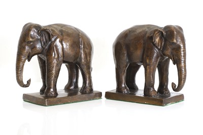Lot 252 - A pair of bronze bookends