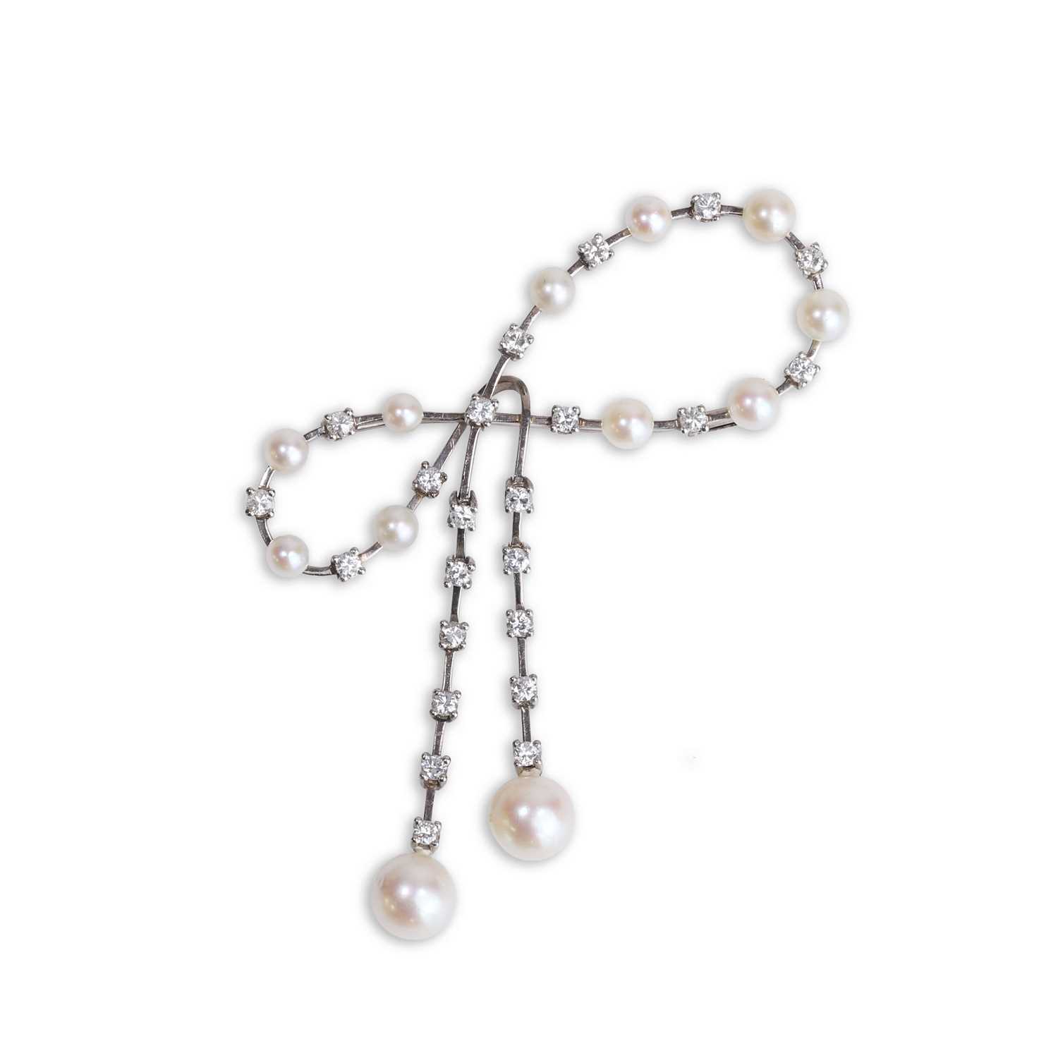 Lot 48 - A diamond and pearl bow brooch