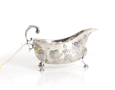 Lot 24 - A silver sauce boat