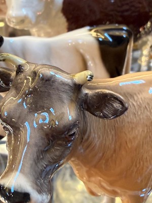 Lot 108 - A collection of Beswick cows and calves
