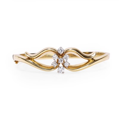 Lot 174 - An 18ct gold diamond bangle