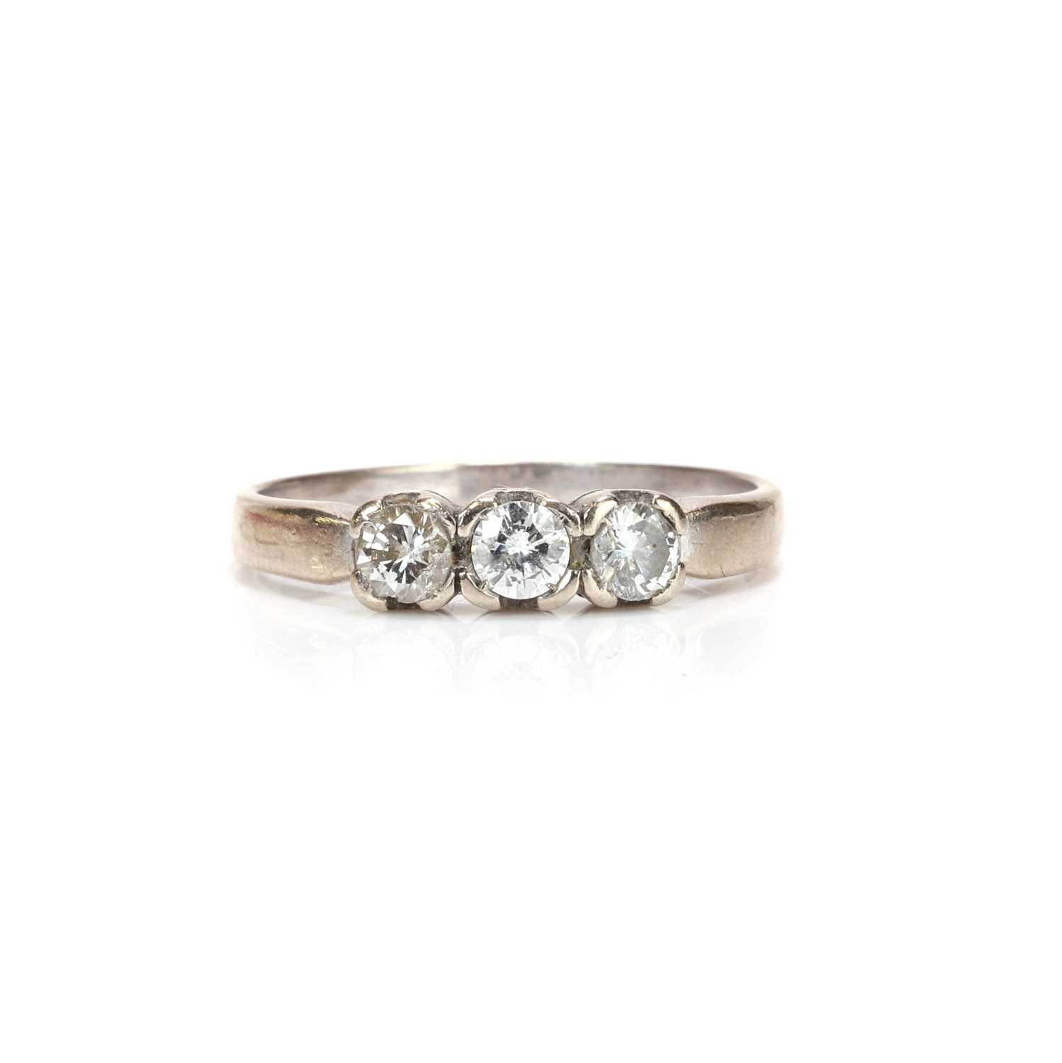 Lot 66 - A 14ct white gold diamond three stone
