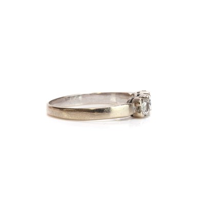 Lot 66 - A 14ct white gold diamond three stone