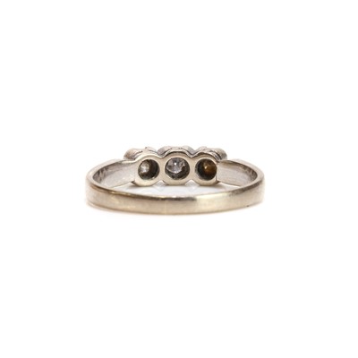 Lot 66 - A 14ct white gold diamond three stone