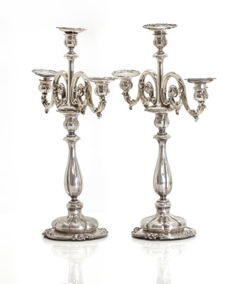 Lot 7 - A pair of Dutch .833 standard silver three-light candelabra