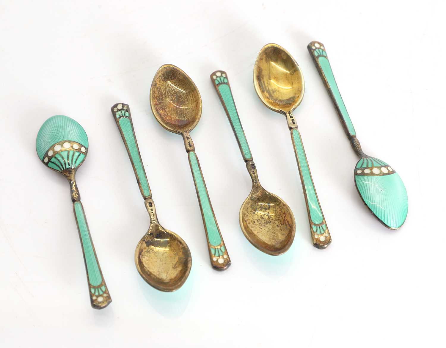 Lot 13 - A set of six silver and enamelled coffee spoons