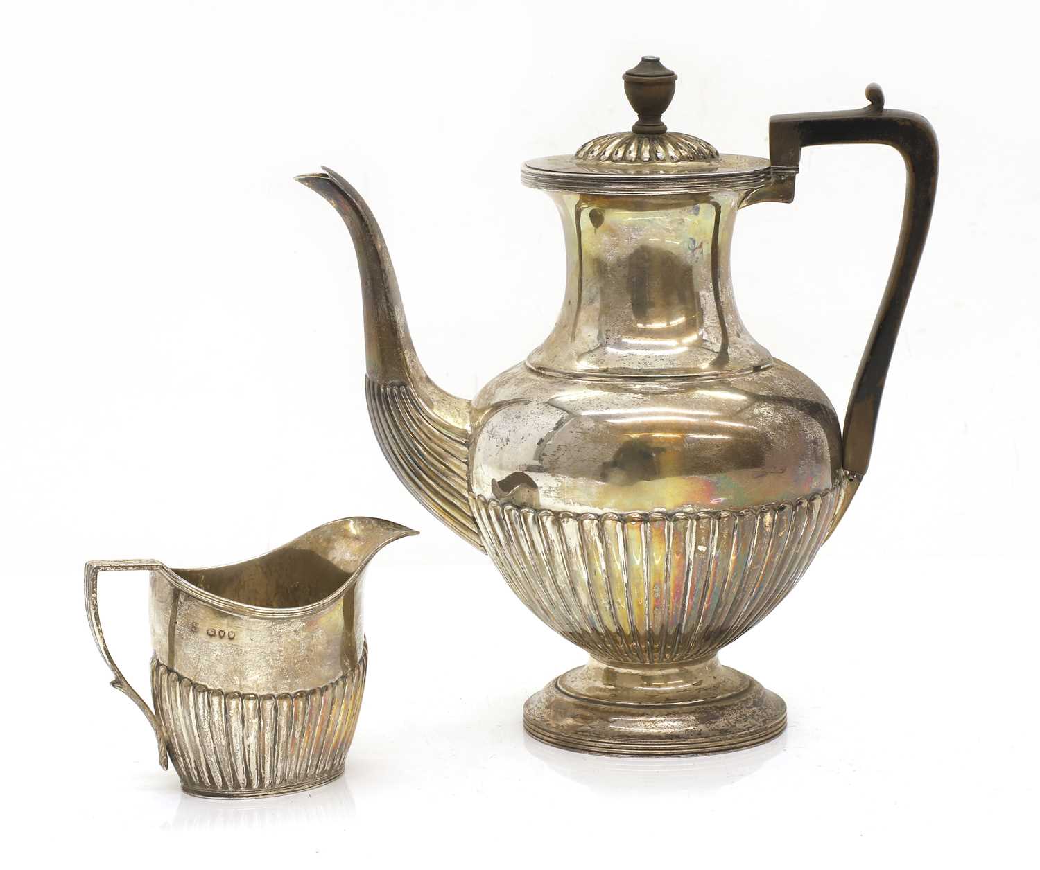Lot 22 - A Victorian silver coffee pot and creamer