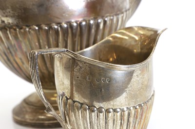 Lot 22 - A Victorian silver coffee pot and creamer