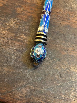 Lot 23 - A pair of Russian cloisonné and silver spoons