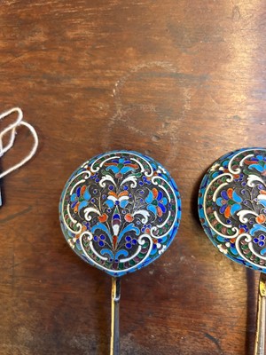 Lot 23 - A pair of Russian cloisonné and silver spoons
