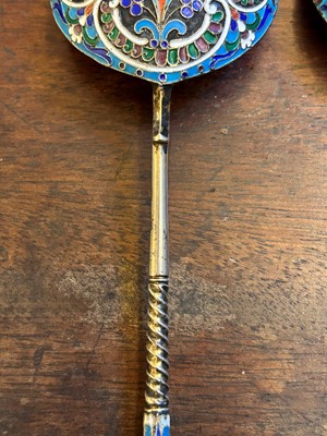 Lot 23 - A pair of Russian cloisonné and silver spoons