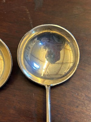 Lot 23 - A pair of Russian cloisonné and silver spoons