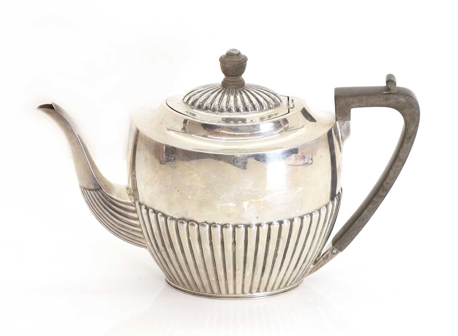 Lot 34 - A silver teapot