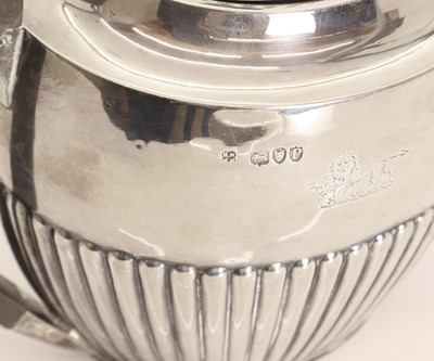 Lot 34 - A silver teapot