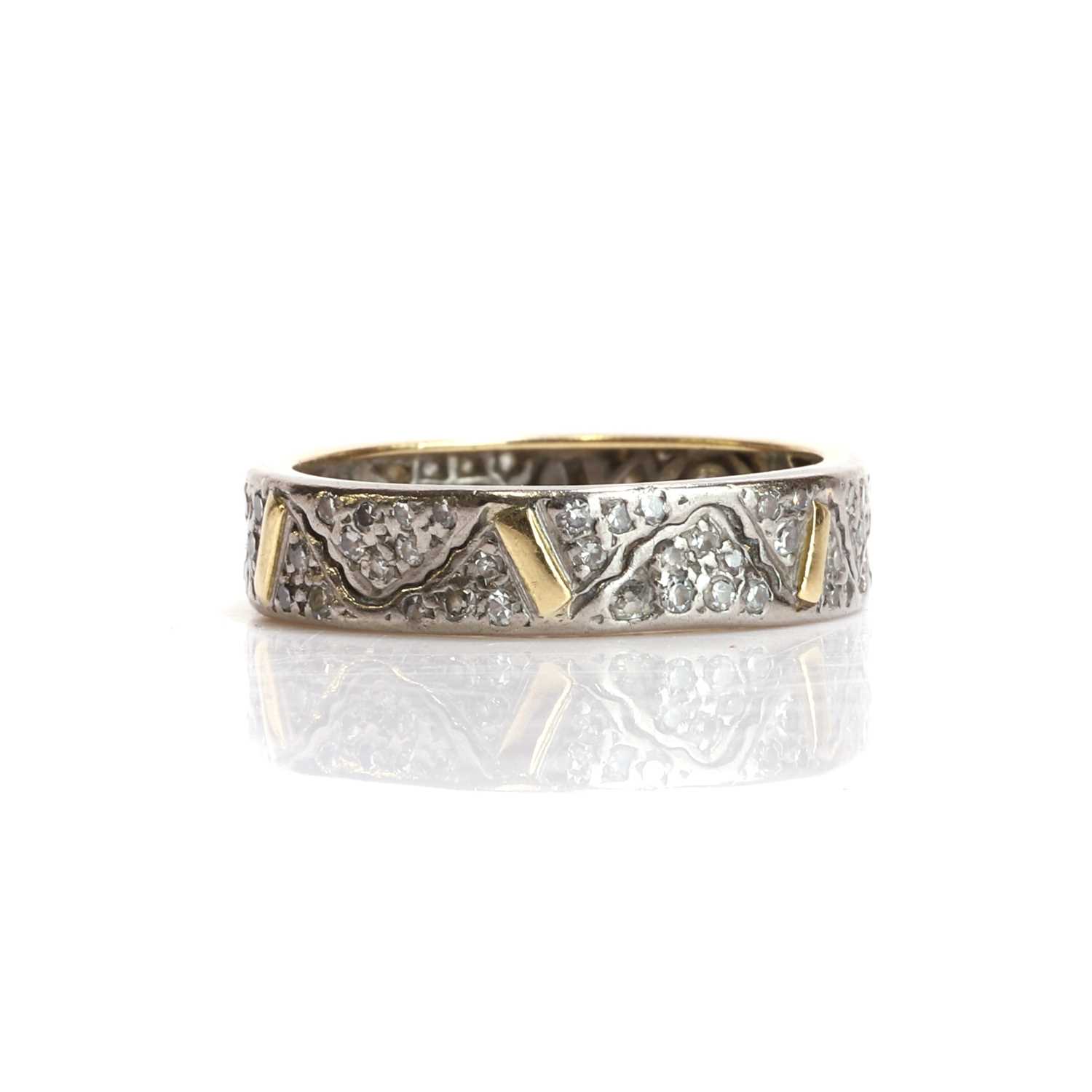 Lot 80 - A diamond set band ring