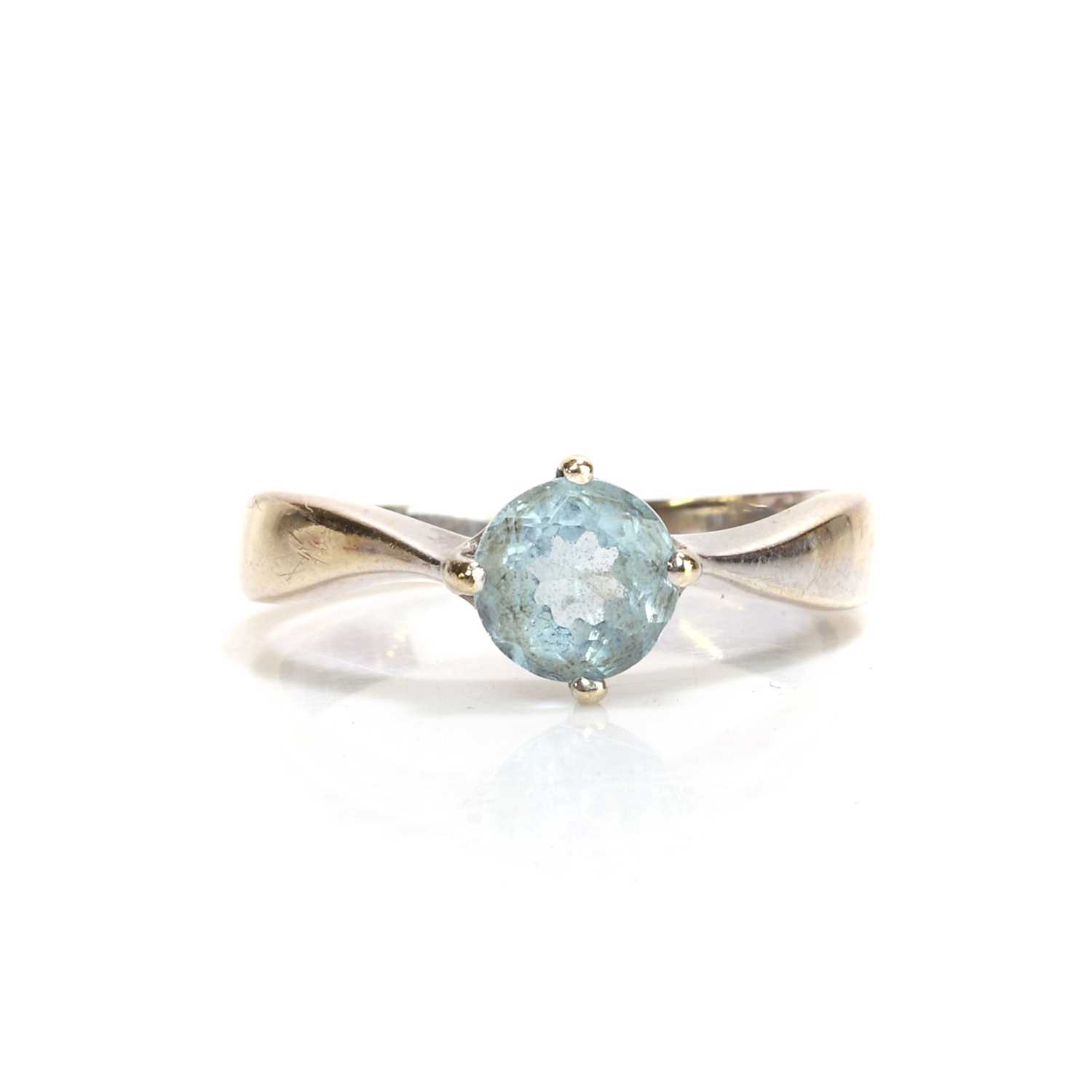 Lot 88 - An 18ct gold topaz single stone ring