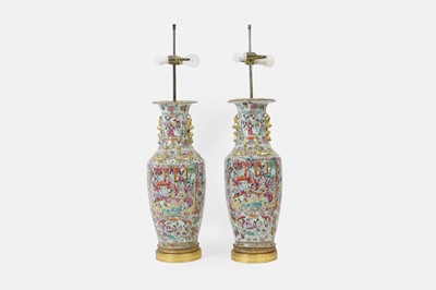 Lot 571 - A pair of large Canton famille rose porcelain vase lamps