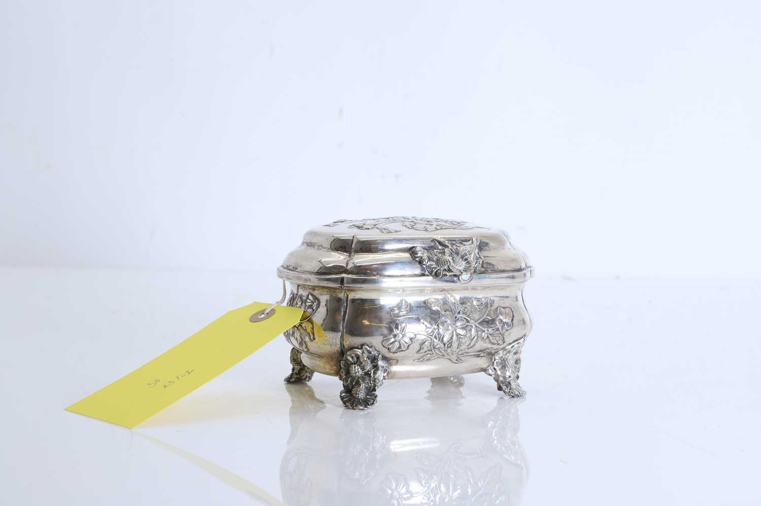 Lot 31 - An Austrian silver and silver gilt hinged casket