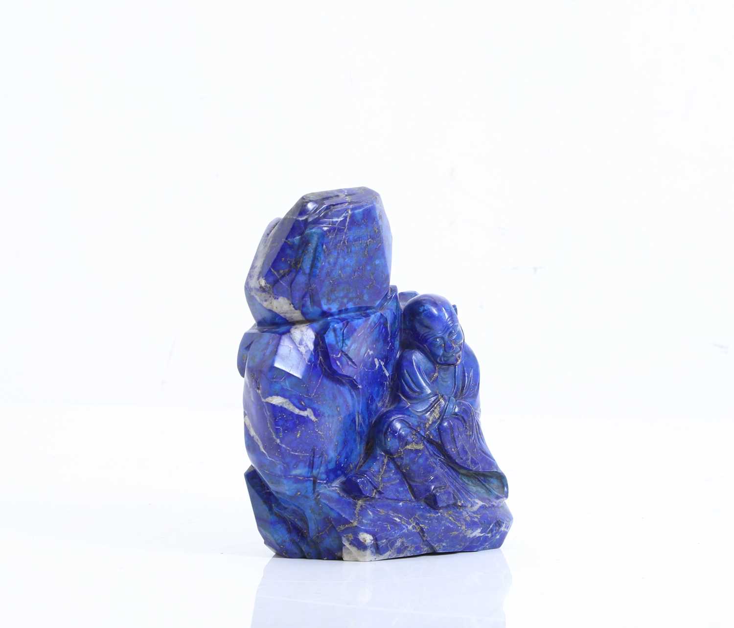 Lot 58 - A Chinese carved lapis lazuli figural group
