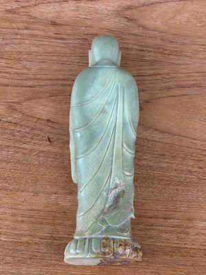 Lot 59 - A Chinese carved jade figure of a Luohan