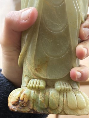 Lot 59 - A Chinese carved jade figure of a Luohan