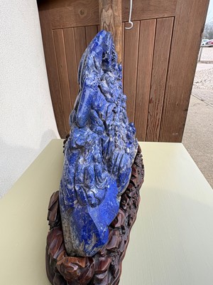 Lot 61 - A Chinese large lapis lazuli figural group