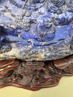 Lot 61 - A Chinese large lapis lazuli figural group