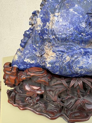 Lot 61 - A Chinese large lapis lazuli figural group