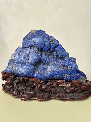 Lot 61 - A Chinese large lapis lazuli figural group