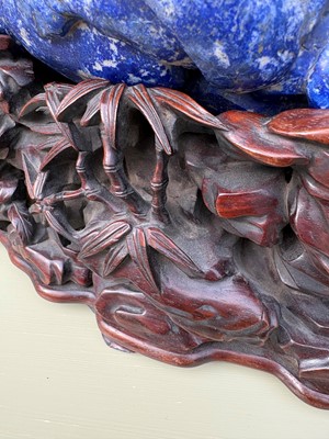 Lot 61 - A Chinese large lapis lazuli figural group