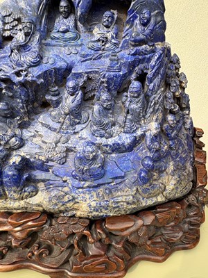 Lot 61 - A Chinese large lapis lazuli figural group