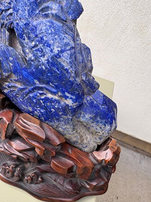 Lot 61 - A Chinese large lapis lazuli figural group