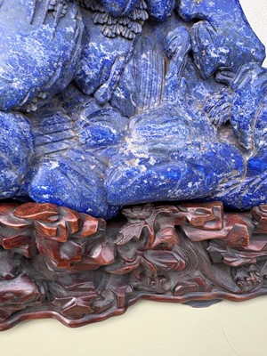 Lot 61 - A Chinese large lapis lazuli figural group