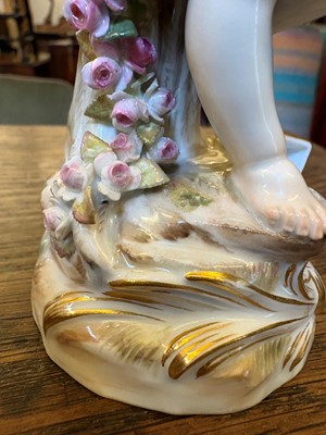 Lot 135 - A Meissen standing Cupid figure