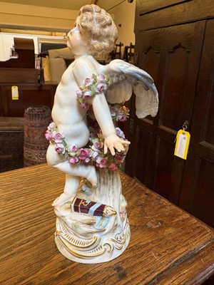 Lot 135 - A Meissen standing Cupid figure