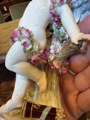 Lot 135 - A Meissen standing Cupid figure