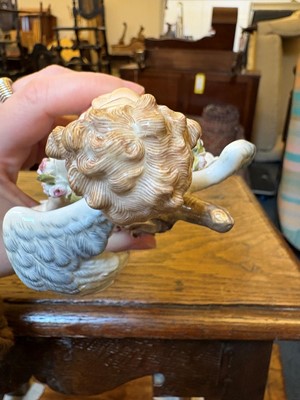 Lot 135 - A Meissen standing Cupid figure