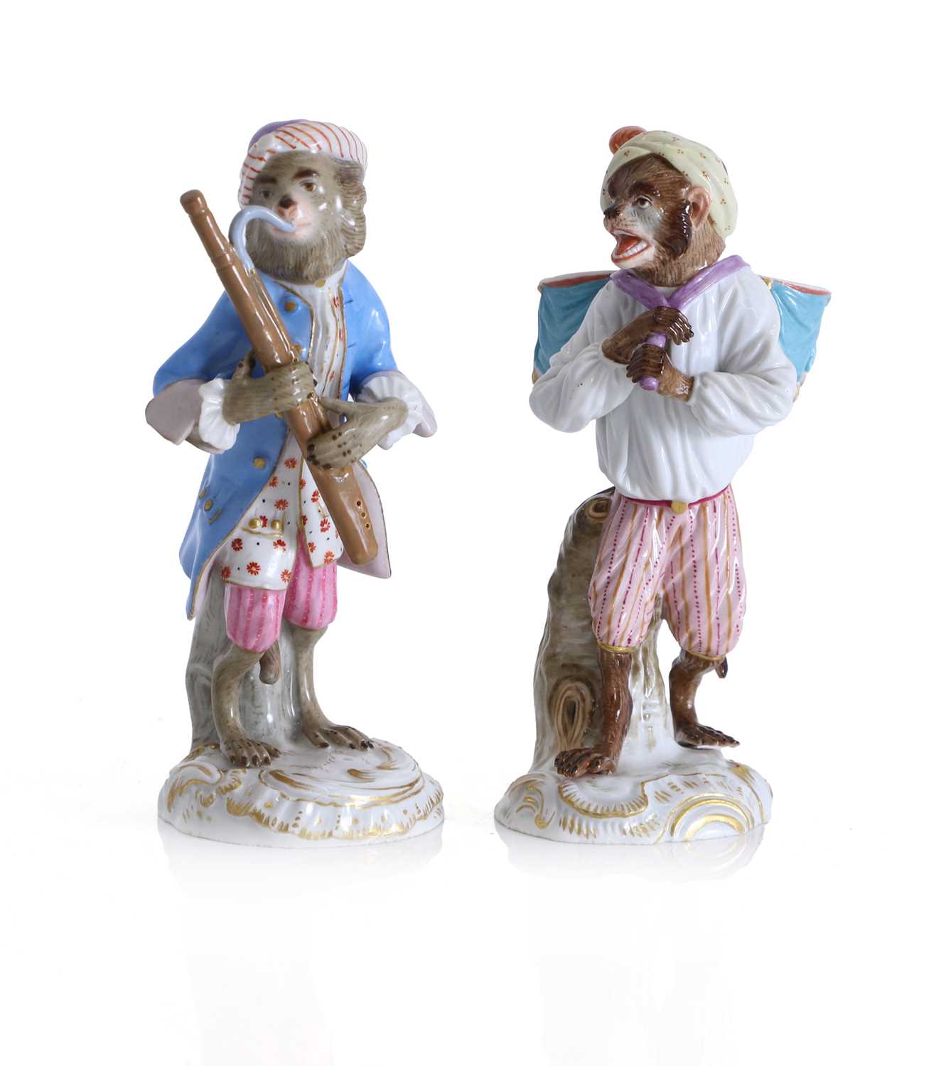 Lot 127 - Two Meissen figures of monkey musicians