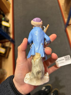Lot 127 - Two Meissen figures of monkey musicians
