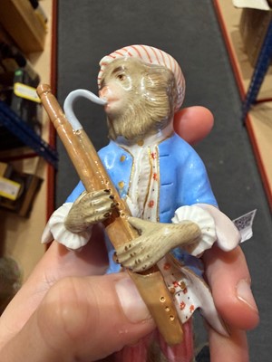 Lot 127 - Two Meissen figures of monkey musicians