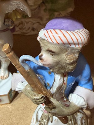 Lot 127 - Two Meissen figures of monkey musicians