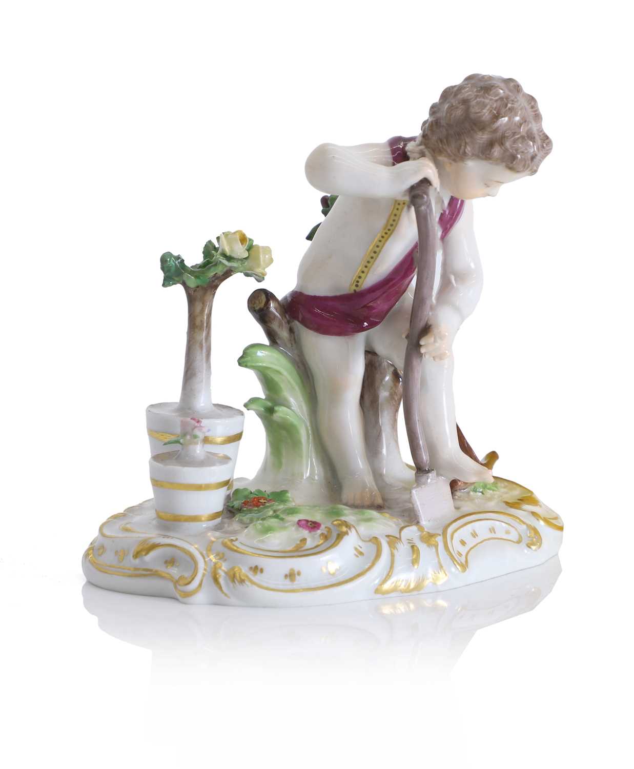 Lot 125 - A Meissen figure of a putto gardener