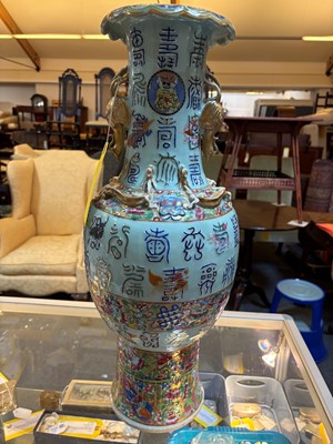 Lot 55 - A large famille rose baluster vase