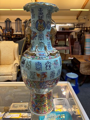 Lot 55 - A large famille rose baluster vase