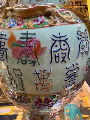 Lot 55 - A large famille rose baluster vase