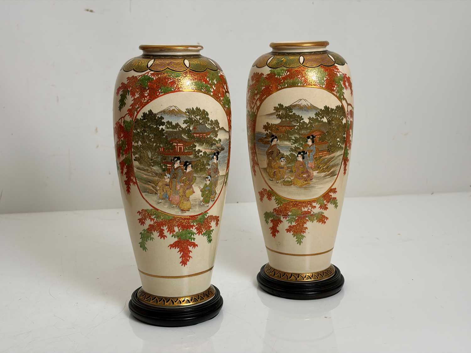 Lot 61 - A pair of Japanese satsuma vases