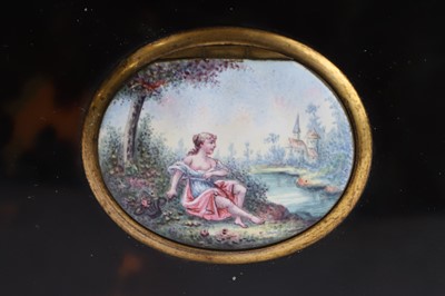Lot 613 - A tortoiseshell cased singing-bird box
