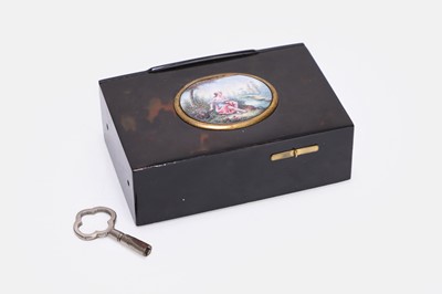 Lot 613 - A tortoiseshell cased singing-bird box