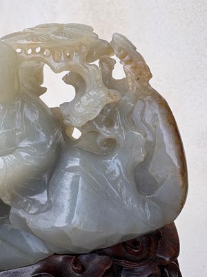 Lot 62 - A carved jade figural group