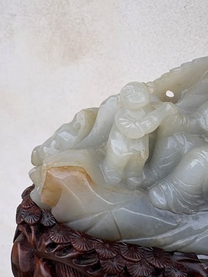 Lot 62 - A carved jade figural group